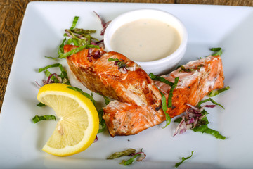 Baked salmon with sauce