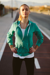 Blond girl prepares to exercises