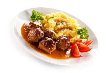 Roasted meatballs, mashed potatoes and vegetables