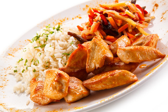 Chicken nuggets, white rice and vegetables