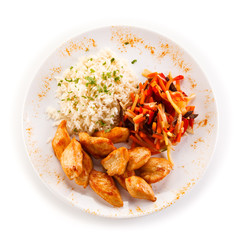 Chicken nuggets, white rice and vegetables