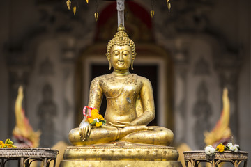 Golden buddha on front of Chiang Mai temple Sonkran festival. Th © 2nix