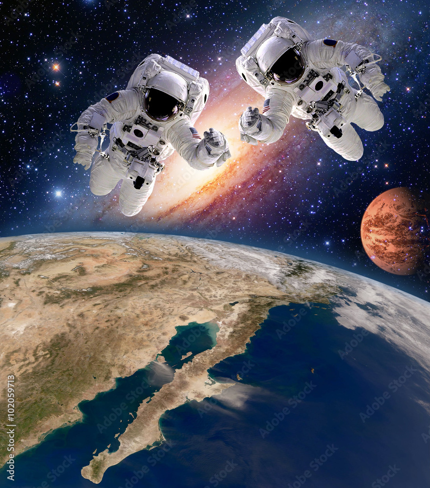 Sticker two astronauts spaceman planet spacewalk outer space walk moon mars galaxy. elements of this image f