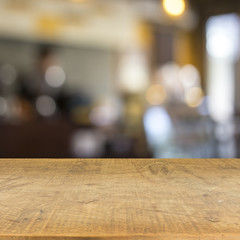 Blur cafe and wood floor texture background
