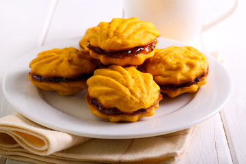 Jam filling biscuits on plate