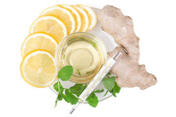 Scheiben Zitrone, Ingwer und Honig mit einem Thermometer