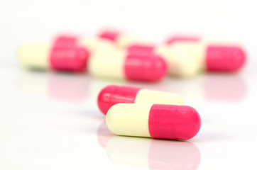 Colorful of oral medications on White Background.