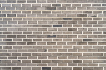 Gray pattern brick wall texture and background.