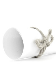 Handmade natural string node tied on white paper roll isolated
