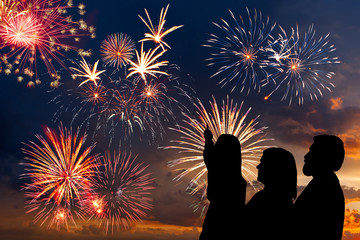 Family looks holiday fireworks