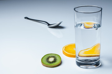 Glass of water with fruit
