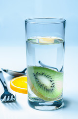 Glass of water with fruit
