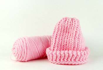 Knitted Pink Stocking Hat and Yarn