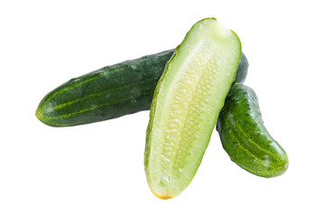 Whole and sliced cucumbers