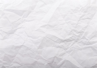 The texture of crumpled paper a4 sheet closeup