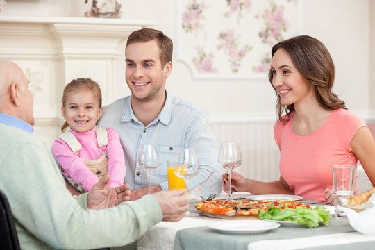 Mature man is dining with his relatives