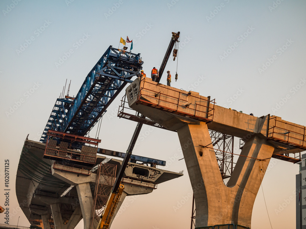 Wall mural express way construction site with unidentified worker