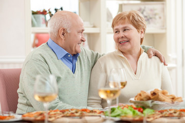 Pretty old husband and wife have a lunch