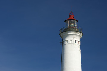 Lynvig Lighthouse against blue sky at the Danish North Sea coast, Lynvig Fyr, Noerre Lyngvig, Jutland, Denmark, Europe
