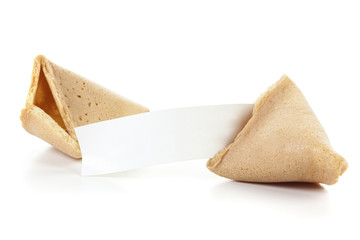 Fortune cookie with blank message slip isolated. Broken fortune cookie with blank paper isolated on...