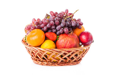 Fruits  in the basket. assorted fruits in wicker basket
