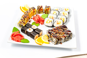 Salmon and caviar rolls served on a plate