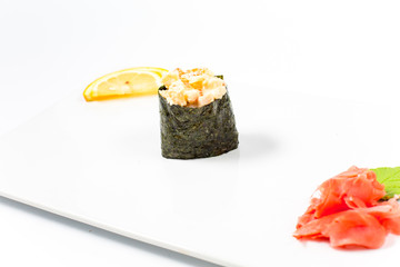 Salmon and caviar rolls served on a plate