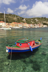 Fototapeta na wymiar Fishing boat moored in Gaios port at Paxos island, Greece. 