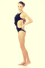 Fototapeta premium Happy young woman in swimsuit.
