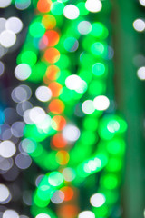 abstract blur blackground with bokeh defocused lights in green color