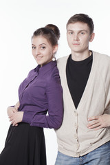 pretty girl and man hugging and looking at us