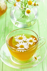 Chamomile tea in glass cup