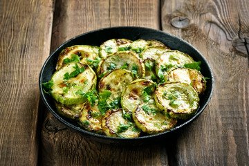 Fried zucchini with herbs