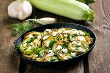 Cooked zucchini with herbs