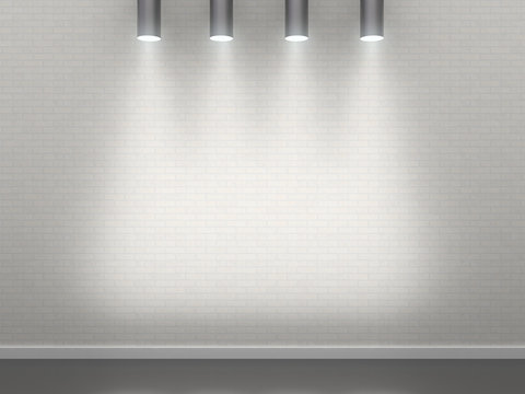 Wall made of bricks. Brick white wall with four cylindrical lamps