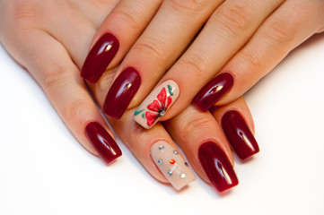 burgundy manicure with rhinestones and modeling
