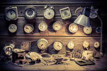 Watchmaker's workshop with clocks to repair