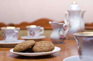 tea with cookies/ tea set and cookies on a plate