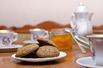 tea with cookies and jam/ tea set, jam and cookies on a plate