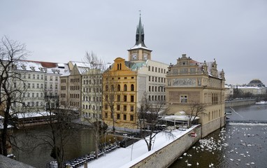 Fototapeta na wymiar Old buildings from Prague with snow