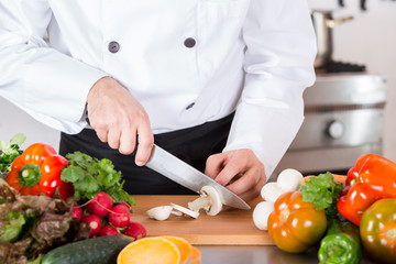 Chef chopping vegetables