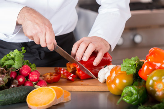 Chef chopping vegetables