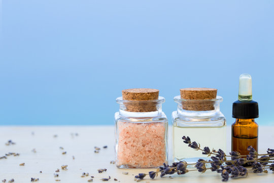 Aroma oils in bottles and salt with lavender