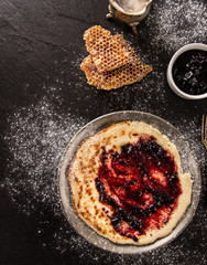 Stack of pancakes with fresh berries