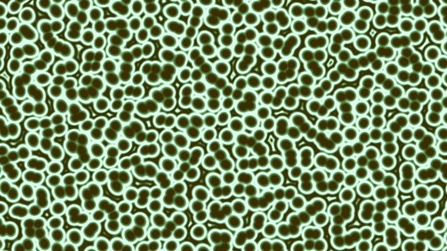 Green Living Cells Background (60fps). An animated moving background full of thousands of microscopic green living cells that are multiplying and flourishing with life.