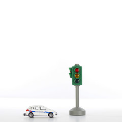 Traffic light and toy police car