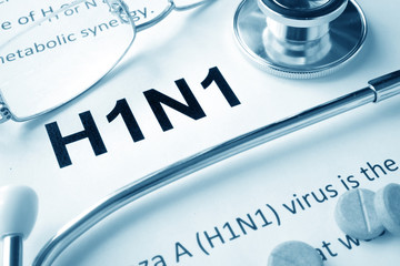 Paper with words  H1N1 diseases and stethoscope.