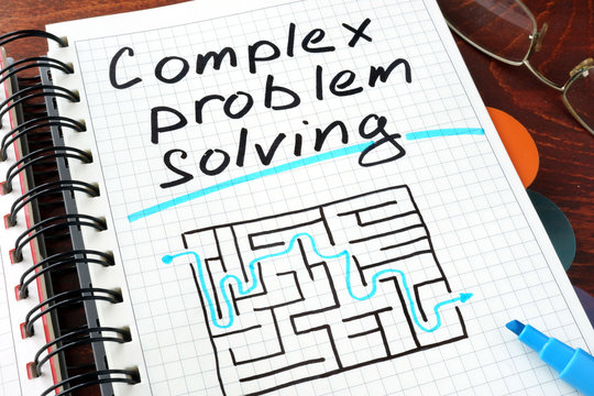 Complex problem solving written on notebook. Business concept.