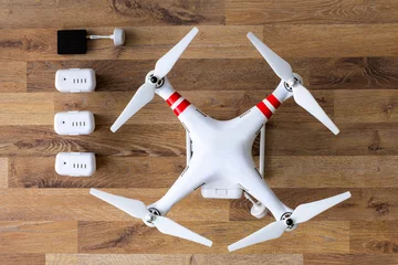 Fotobehang top view drone with camera. © luckybusiness
