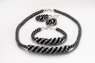Elegant jewellery set isolated on a white background.